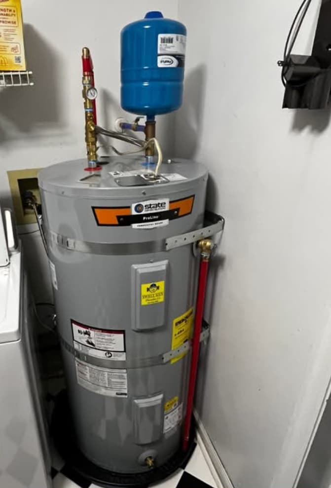 State ProLine electric tank water heater with thermal expansion tank — Leawood home installation